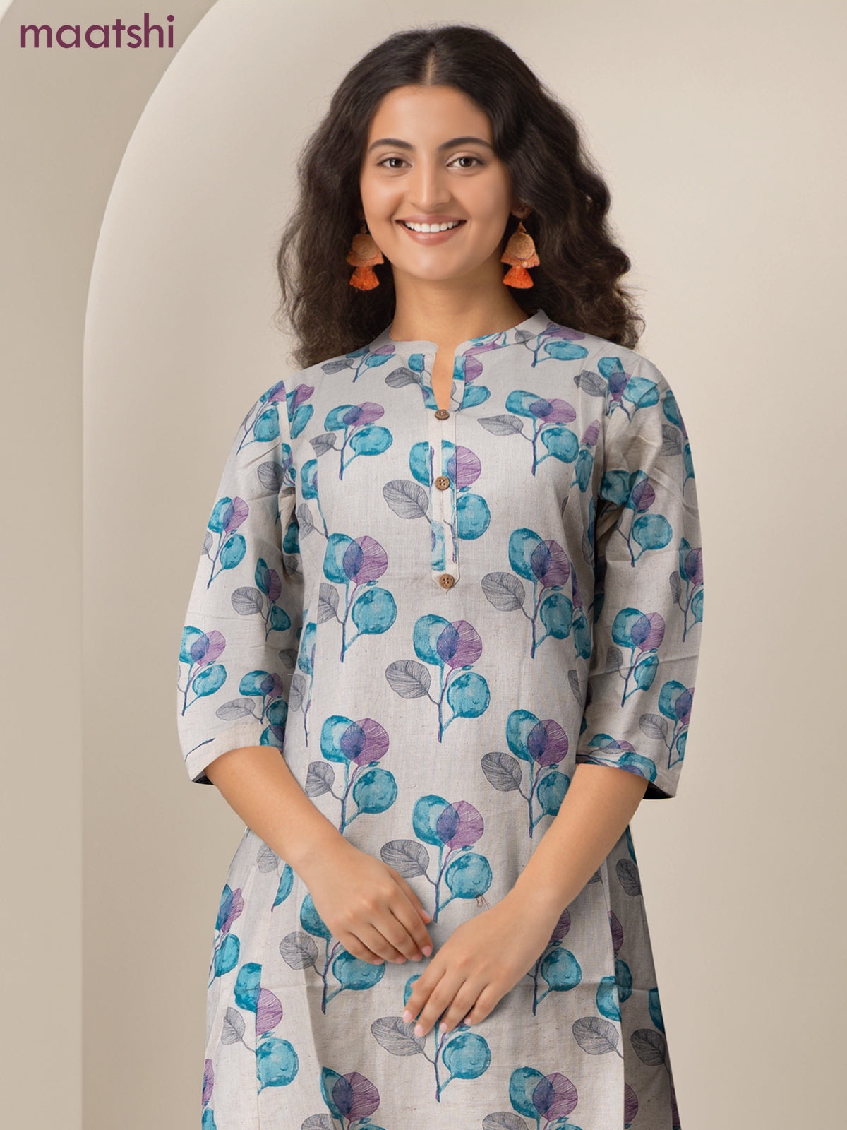 Cotton a-line kurti cream and teal blue shade with allover butta prints & simpe neck pattern without pant