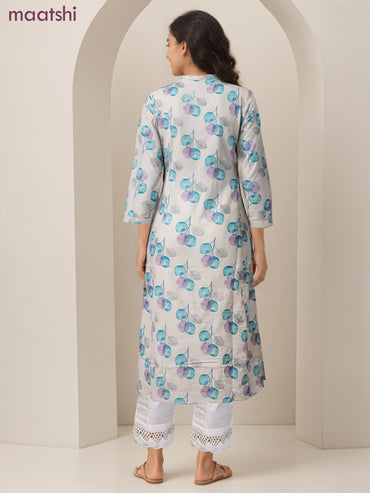 Cotton a-line kurti cream and teal blue shade with allover butta prints & simpe neck pattern without pant