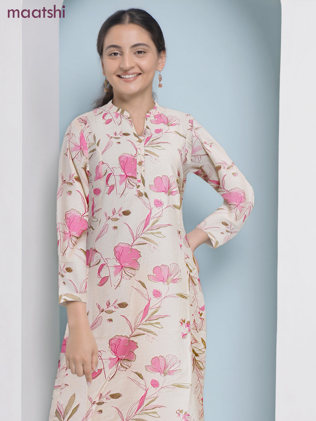 Cotton a-line kurti cream and pink shade with allover floral prints & simple neck pattern without pant
