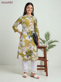 Cotton a-line kurti cream and lime green with allover prints & simple neck pattern without pant