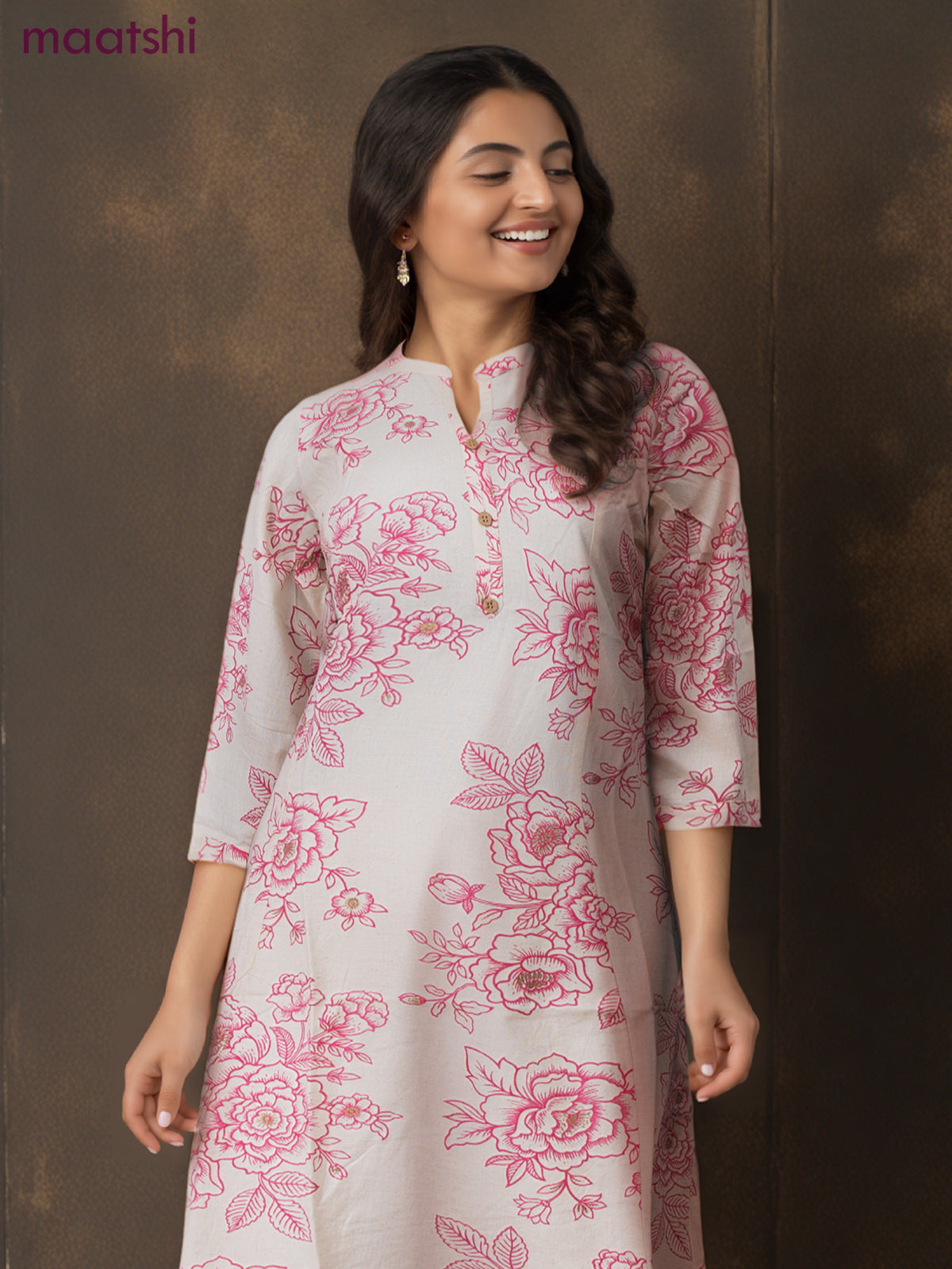 Cotton a-line kurti cream and pink shade with allover floral prints & simple neck pattern without pant