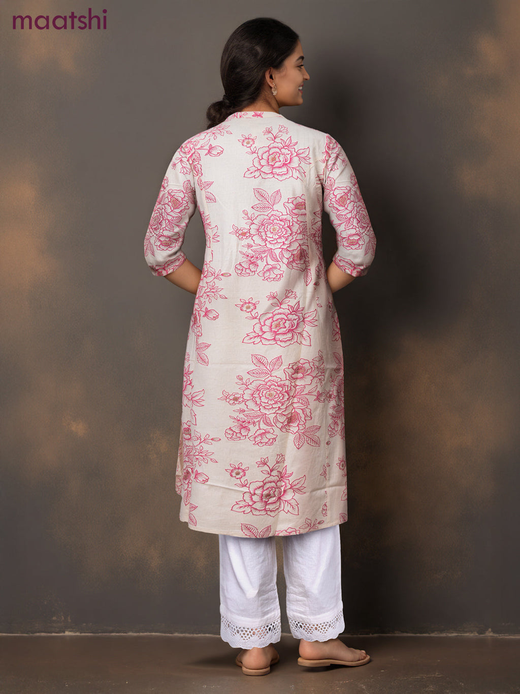 Cotton a-line kurti cream and pink shade with allover floral prints & simple neck pattern without pant