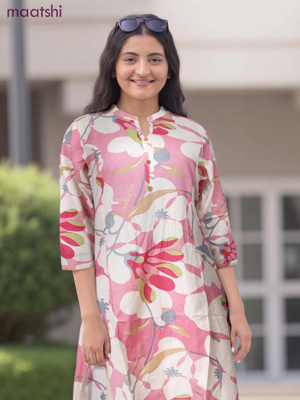 Cotton a-line kurti cream and peach pink with allover prints & simple neck pattern without pant