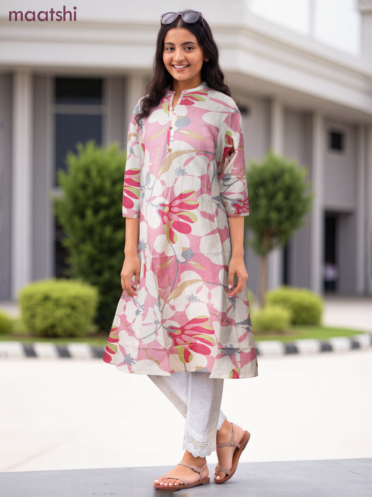 Cotton a-line kurti cream and peach pink with allover prints & simple neck pattern without pant