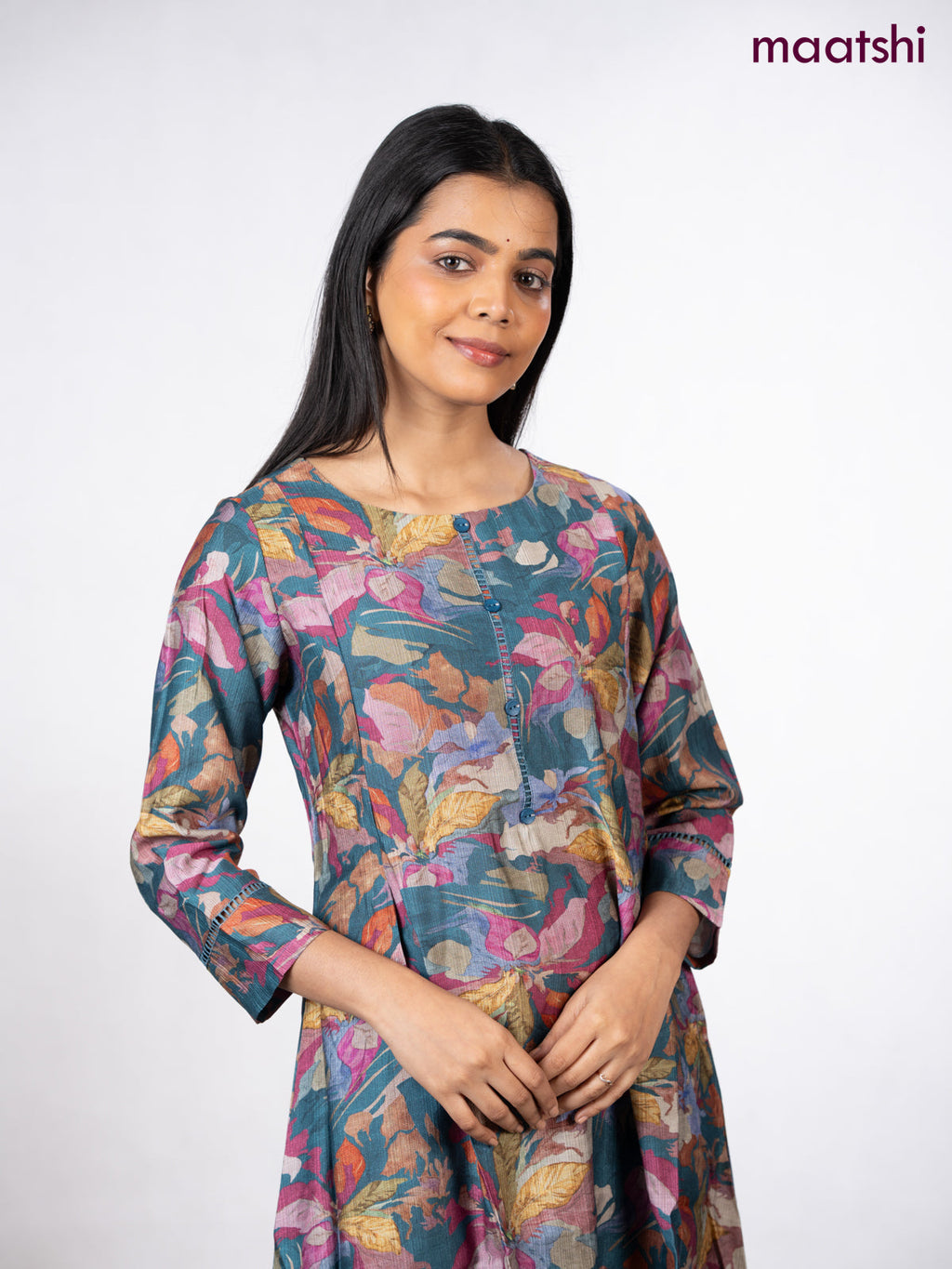 Rayon a-line kurti peacock blue with allover floral prints & simple neck pattern without pant
