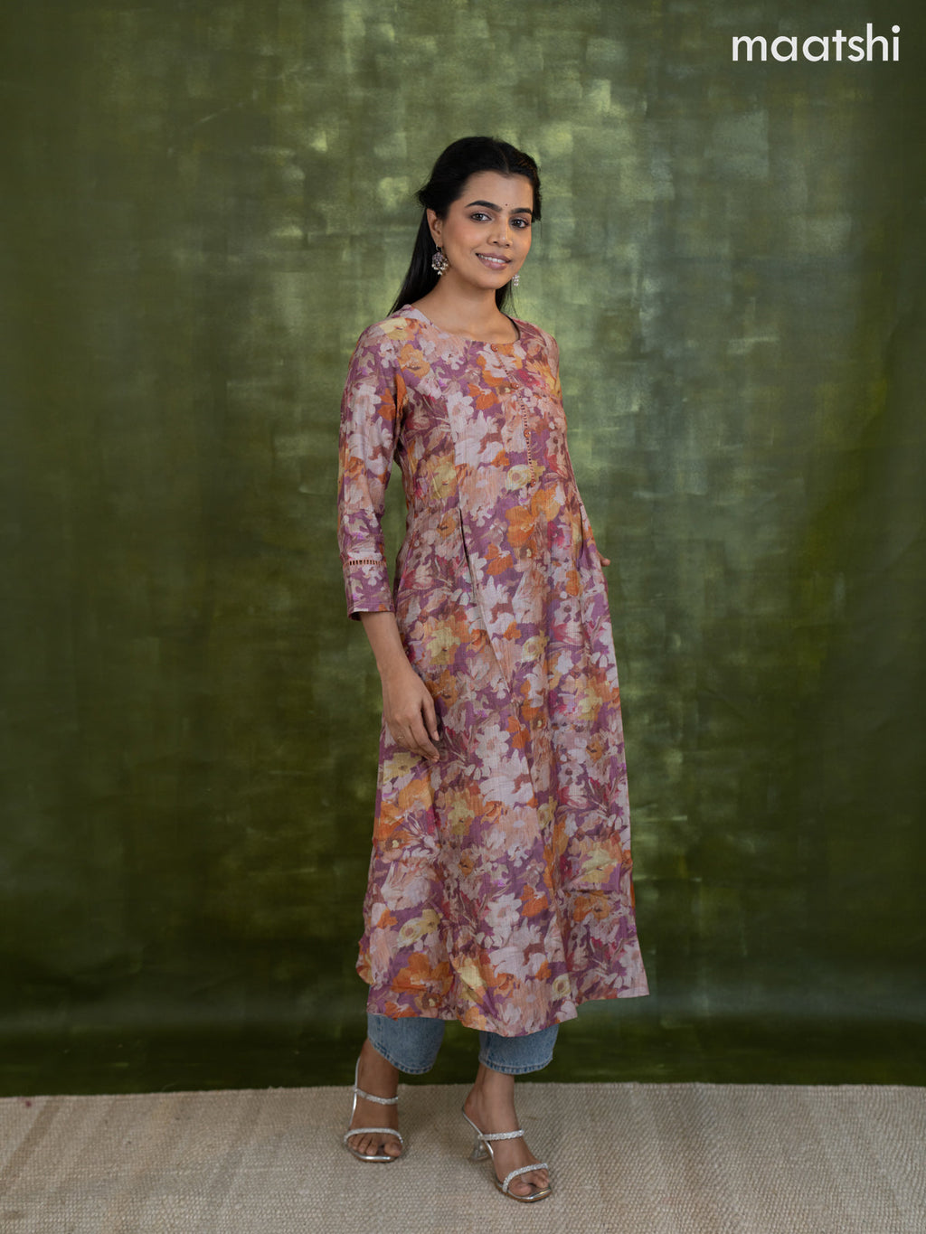 Rayon a-line kurti mauve pink with allover floral prints & simple neck pattern without pant