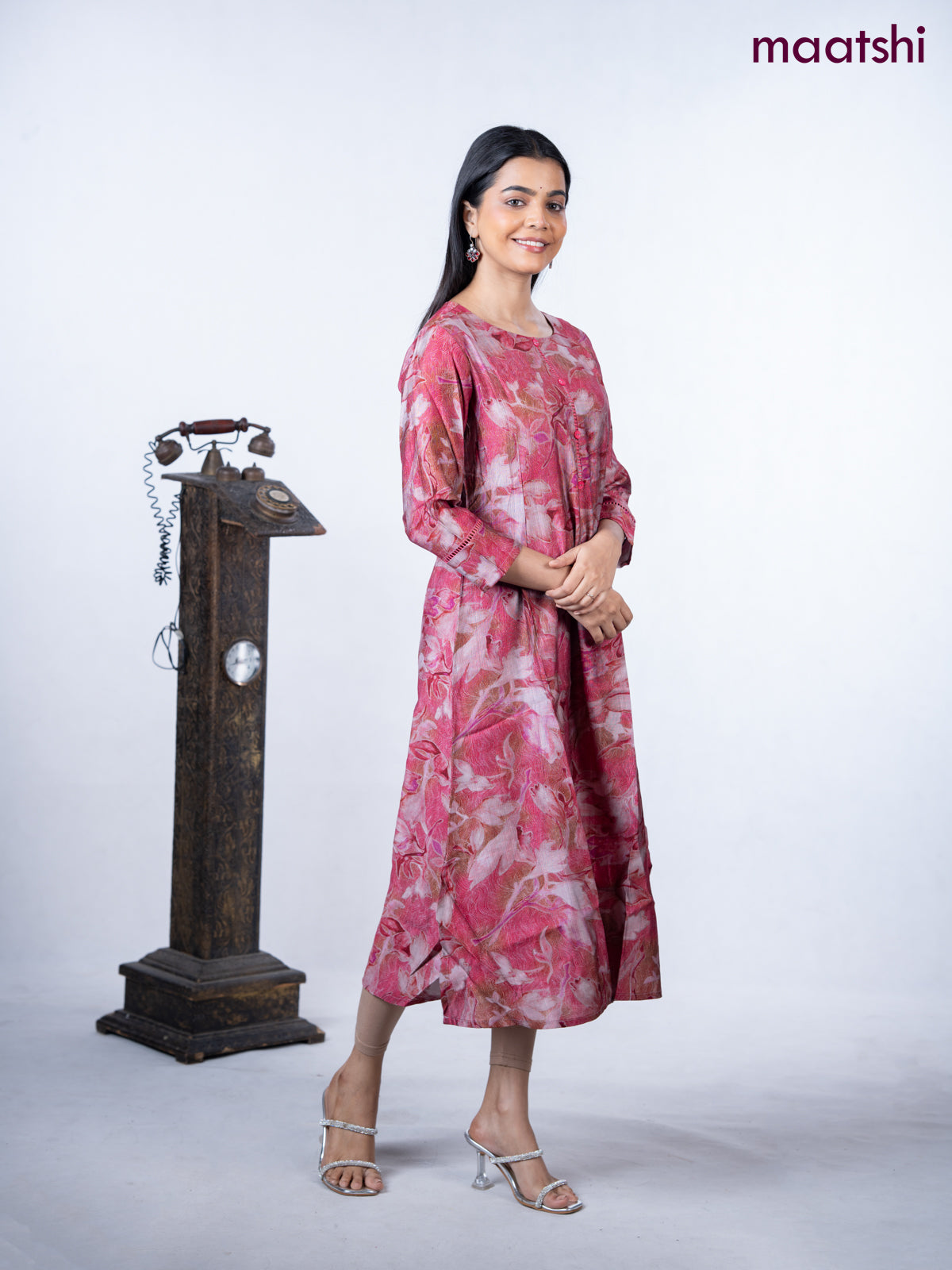 Rayon a-line kurti maroon shade with allover prints & simple neck pattern without pant