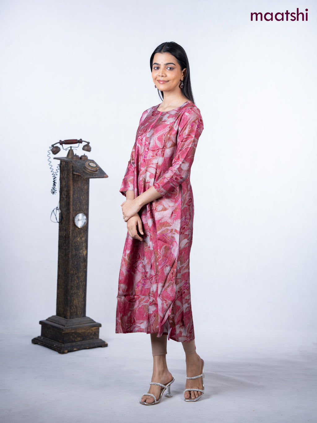 Rayon a-line kurti maroon shade with allover prints & simple neck pattern without pant
