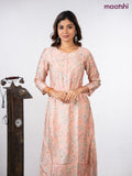 Rayon a-line kurti peach shade with allover floral prints & simple neck pattern without pant