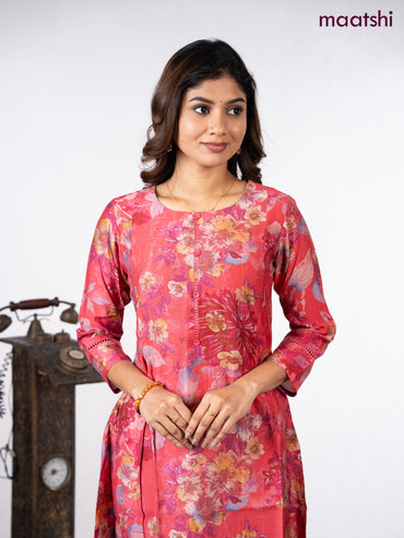 Rayon a-line kurti peach pink with allover floral prints & simple neck pattern without pant