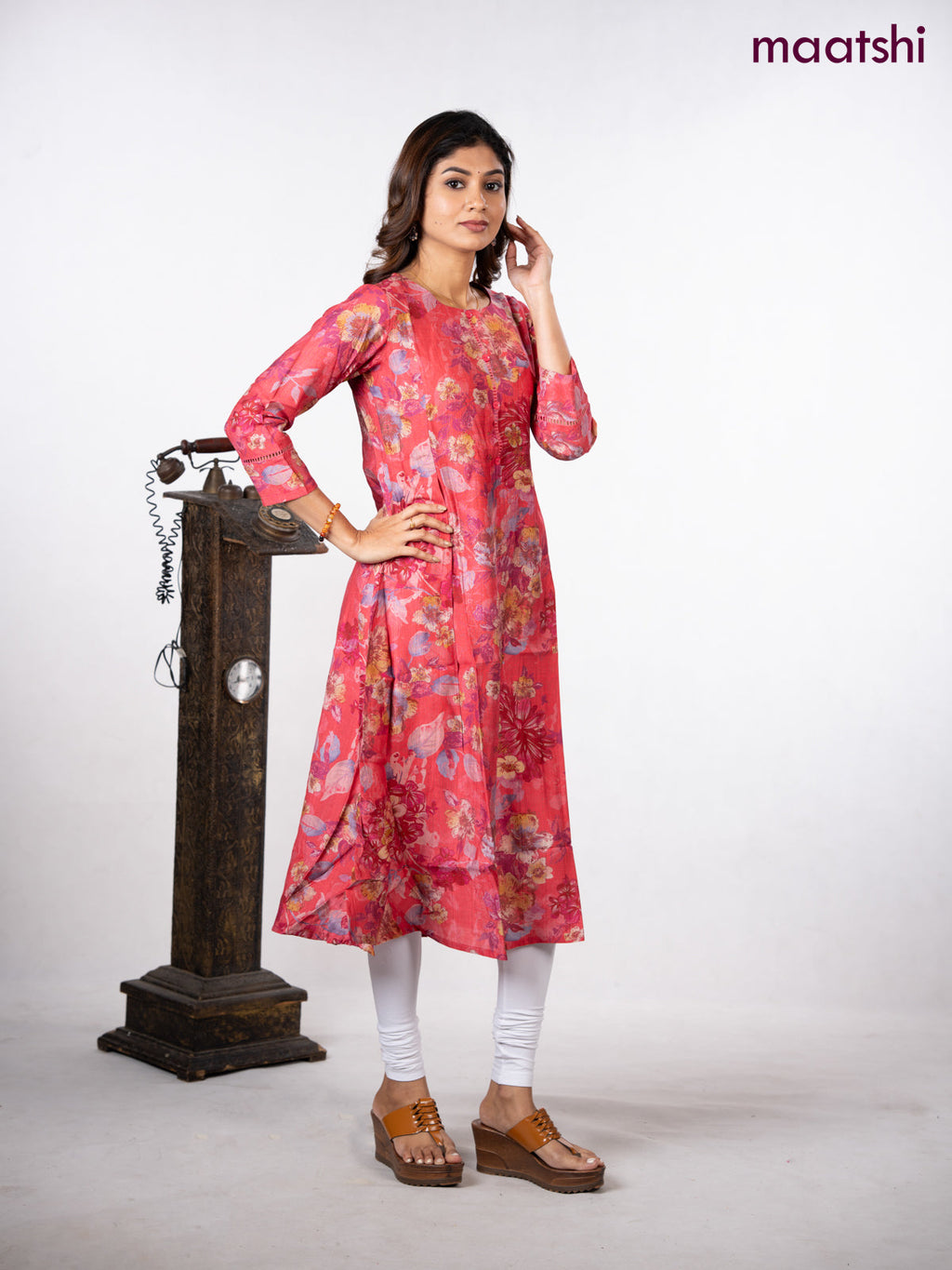 Rayon a-line kurti peach pink with allover floral prints & simple neck pattern without pant