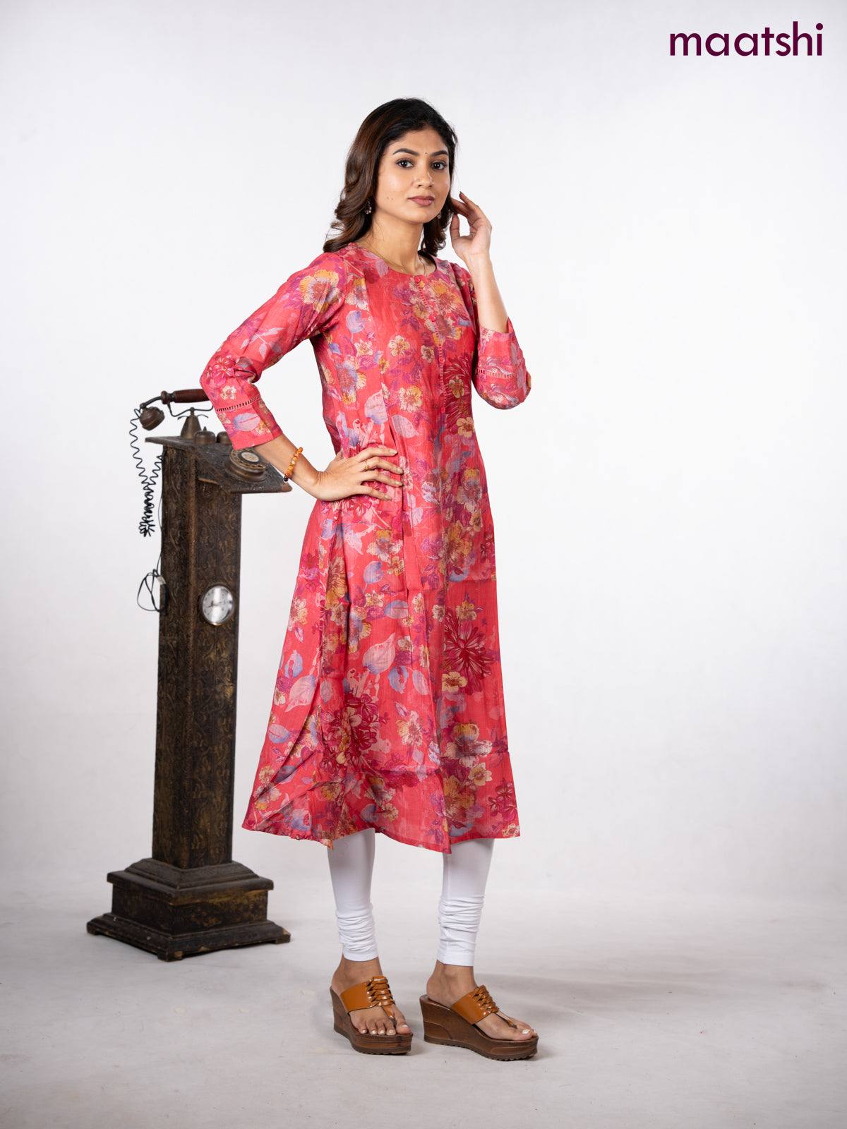 Rayon a-line kurti peach pink with allover floral prints & simple neck pattern without pant