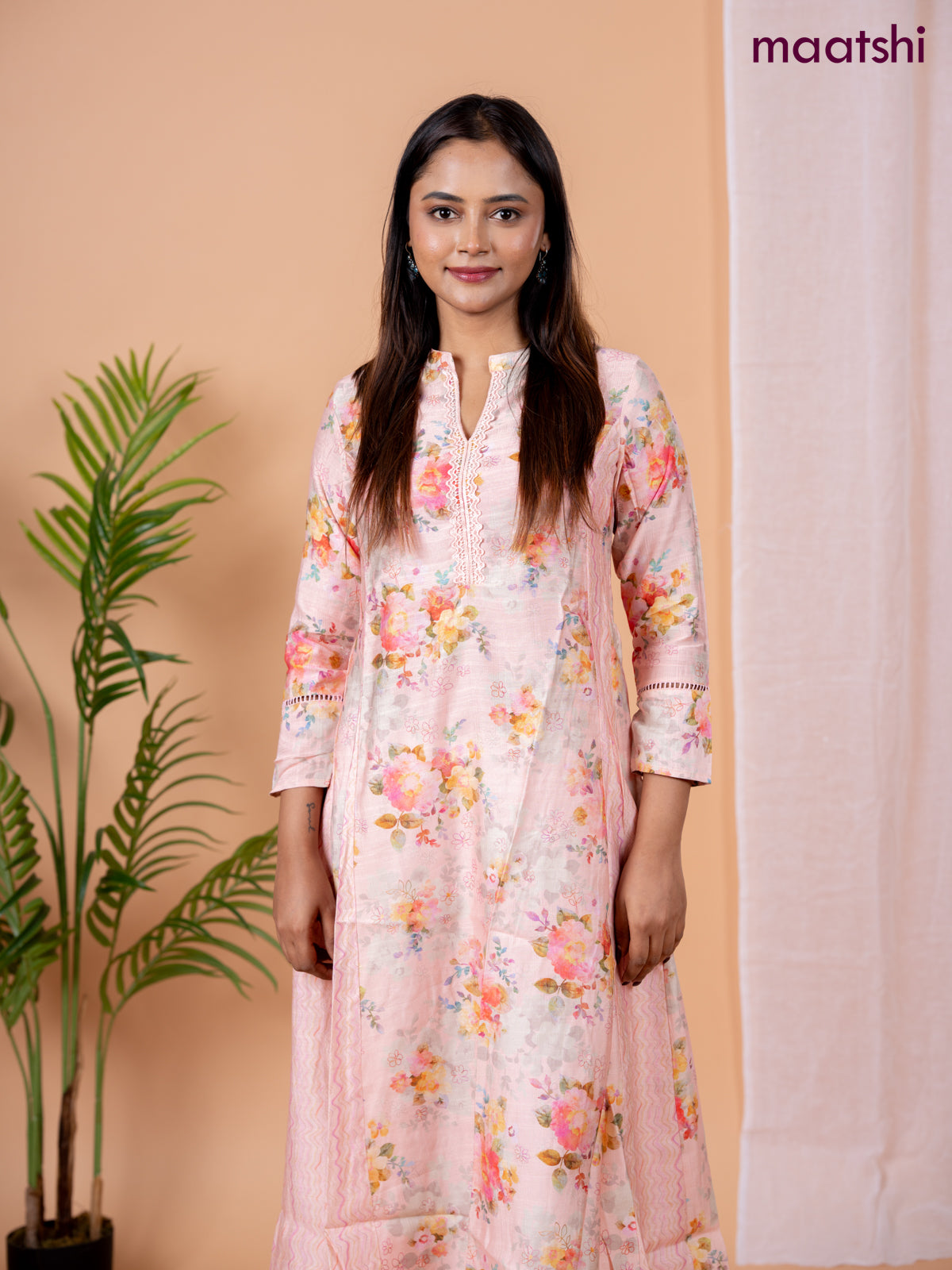 Rayon anarkali kurti peach shade with allover floral prints & sequin lace work neck pattern without pant