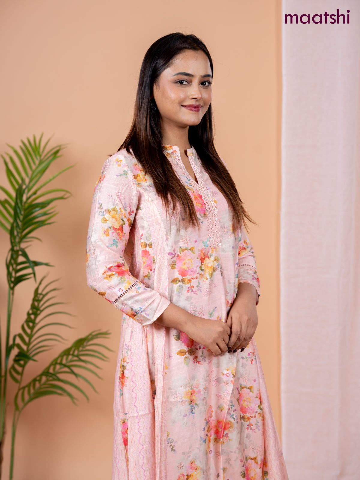 Rayon anarkali kurti peach shade with allover floral prints & sequin lace work neck pattern without pant