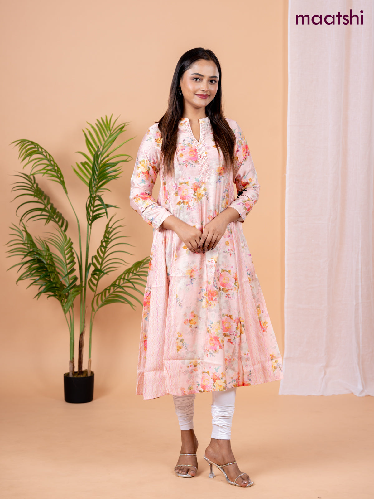 Rayon anarkali kurti peach shade with allover floral prints & sequin lace work neck pattern without pant