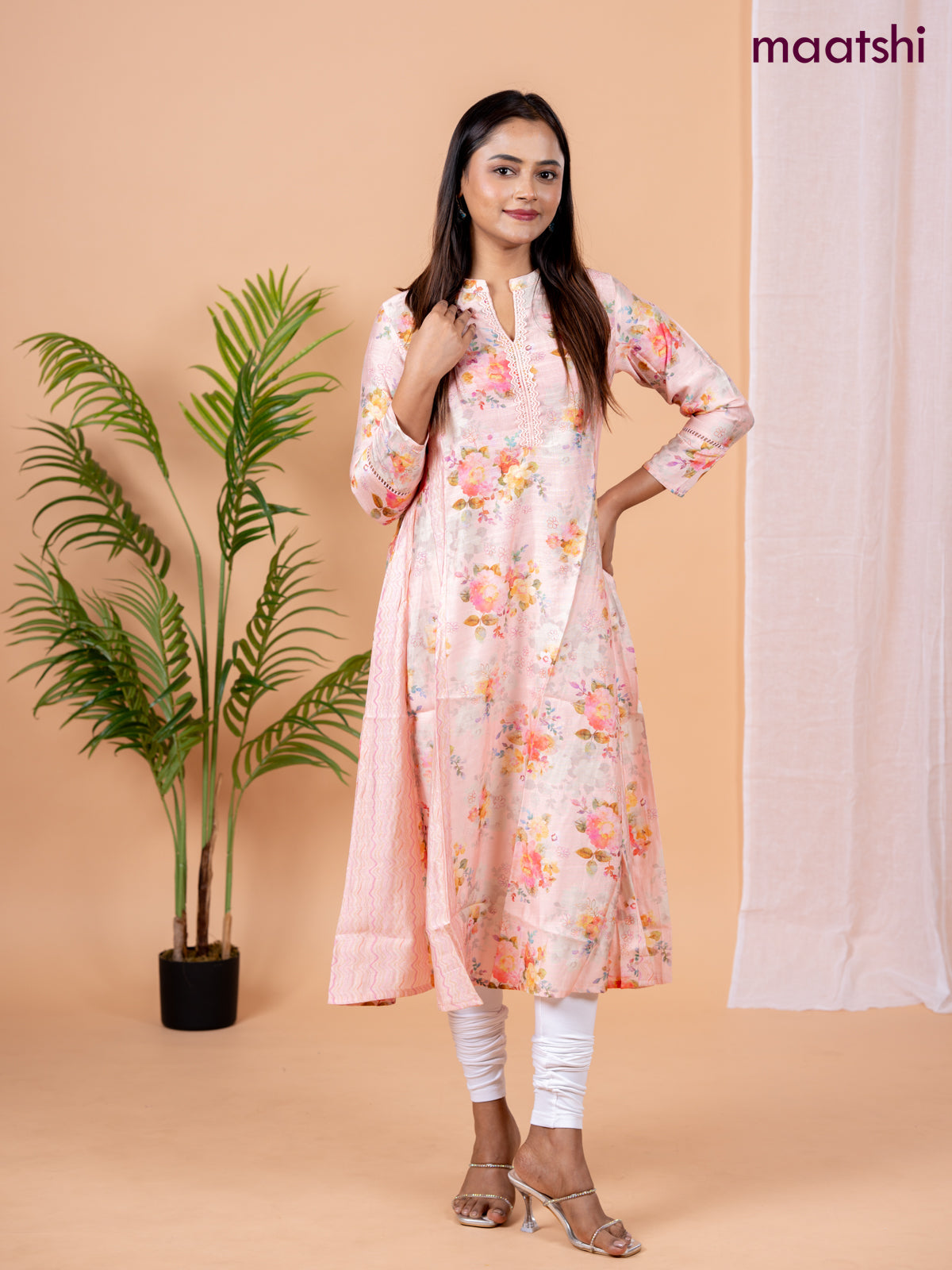 Rayon anarkali kurti peach shade with allover floral prints & sequin lace work neck pattern without pant
