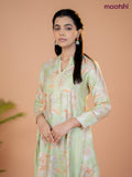 Rayon anarkali kurti pista green with allover floral prints & sequin lace work neck pattern without pant