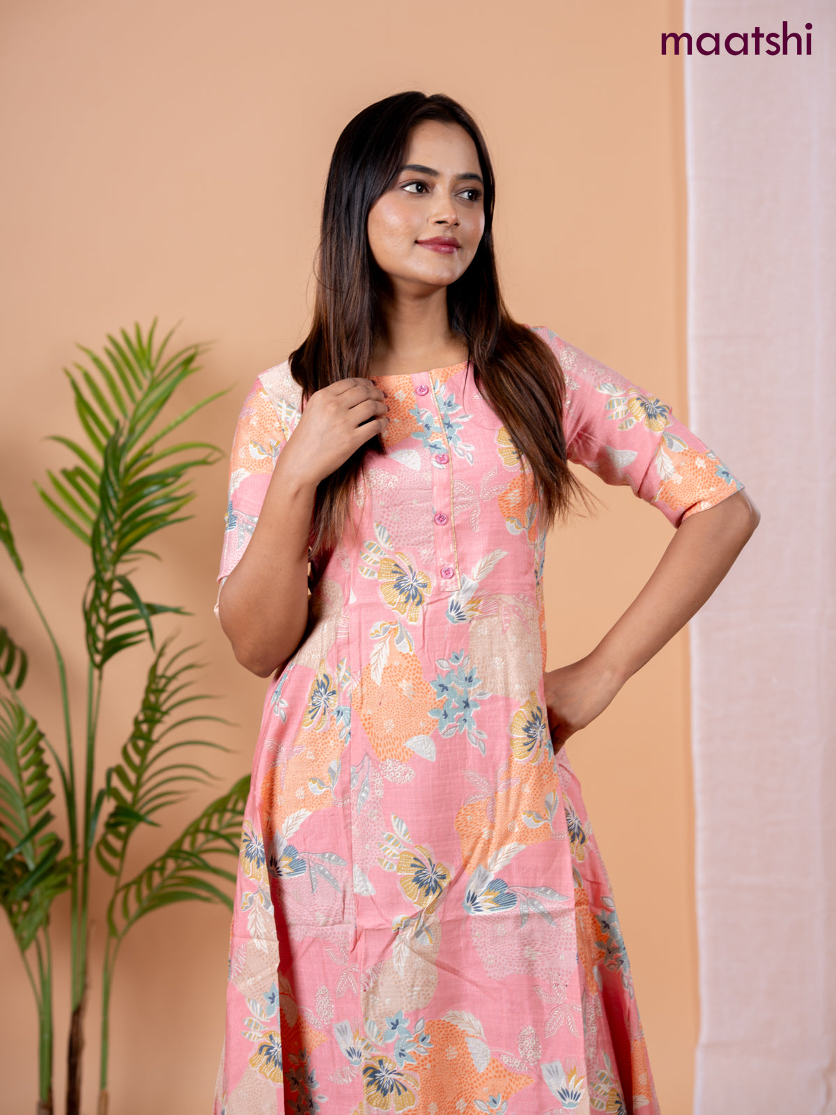 Rayon anarkali kurti peach pink with allover floral prints & simple neck pattern without pant