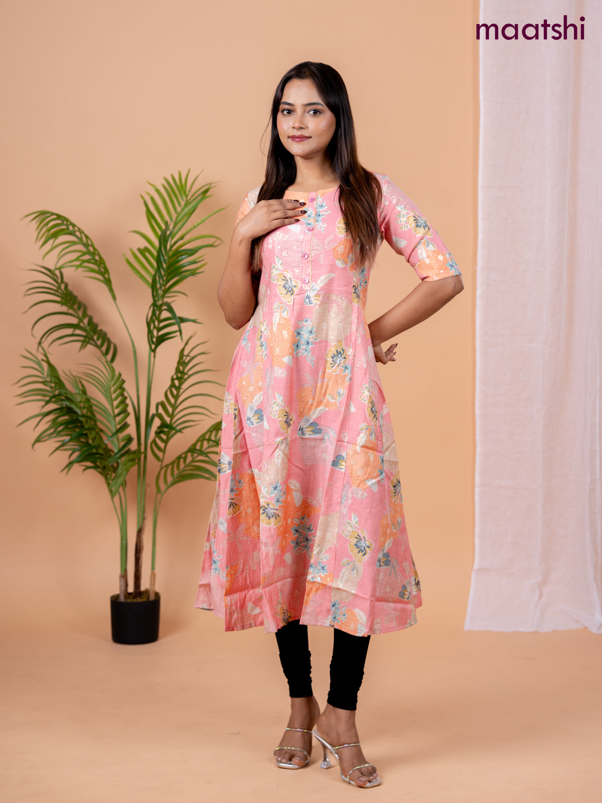 Rayon anarkali kurti peach pink with allover floral prints & simple neck pattern without pant