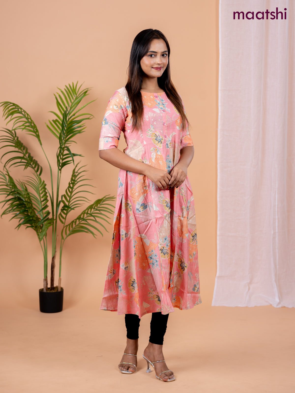 Rayon anarkali kurti peach pink with allover floral prints & simple neck pattern without pant