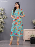 Rayon anarkali kurti teal shade with allover floral prints & simple neck pattern without pant