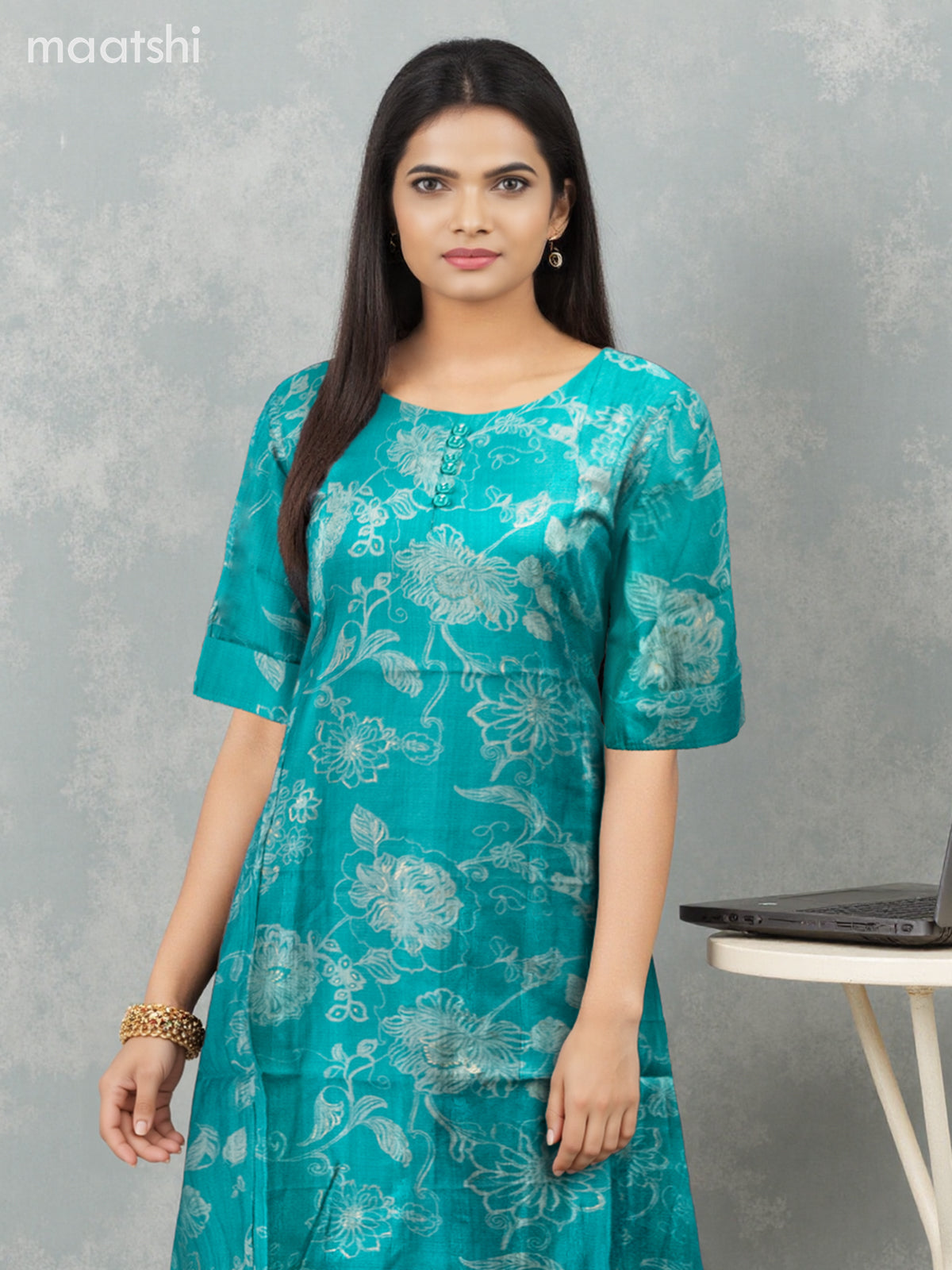 Rayon anarkali kurti teal green with allover floral prints & simple neck pattern without pant