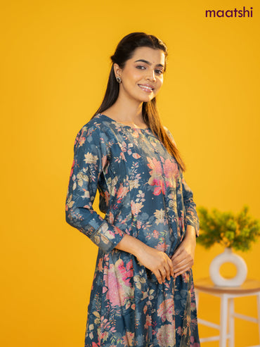 Rayon a-line kurti peacock blue with allover floral prints & simple neck pattern without pant