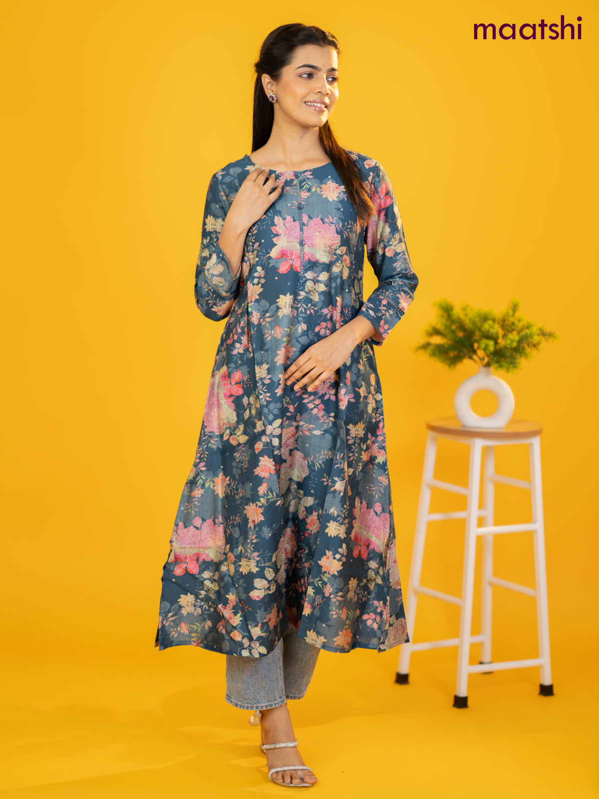 Rayon a-line kurti peacock blue with allover floral prints & simple neck pattern without pant