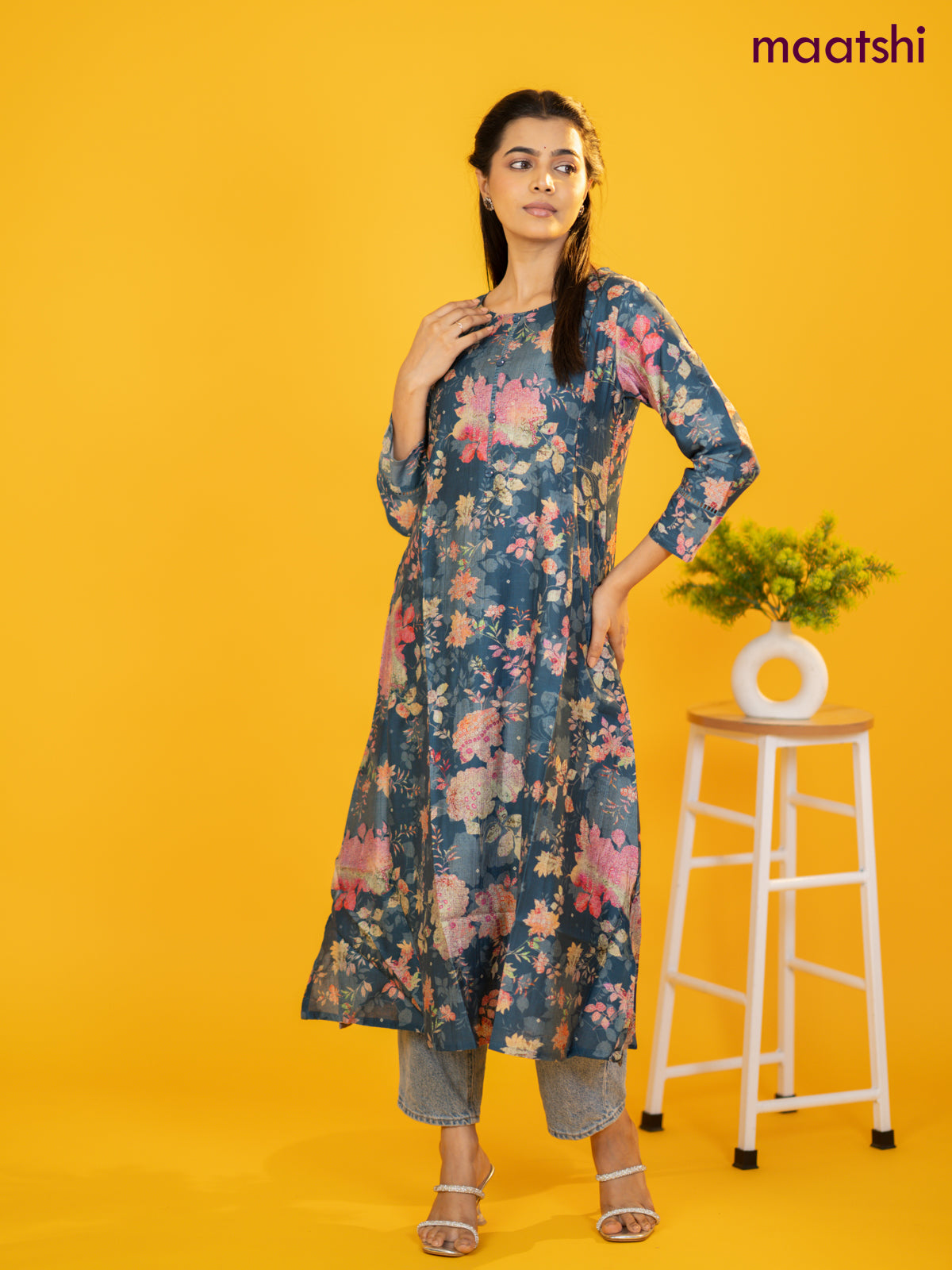 Rayon a-line kurti peacock blue with allover floral prints & simple neck pattern without pant