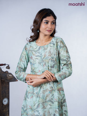 Rayon a-line kurti teal green shade with allover floral prints & simple neck pattern without pant