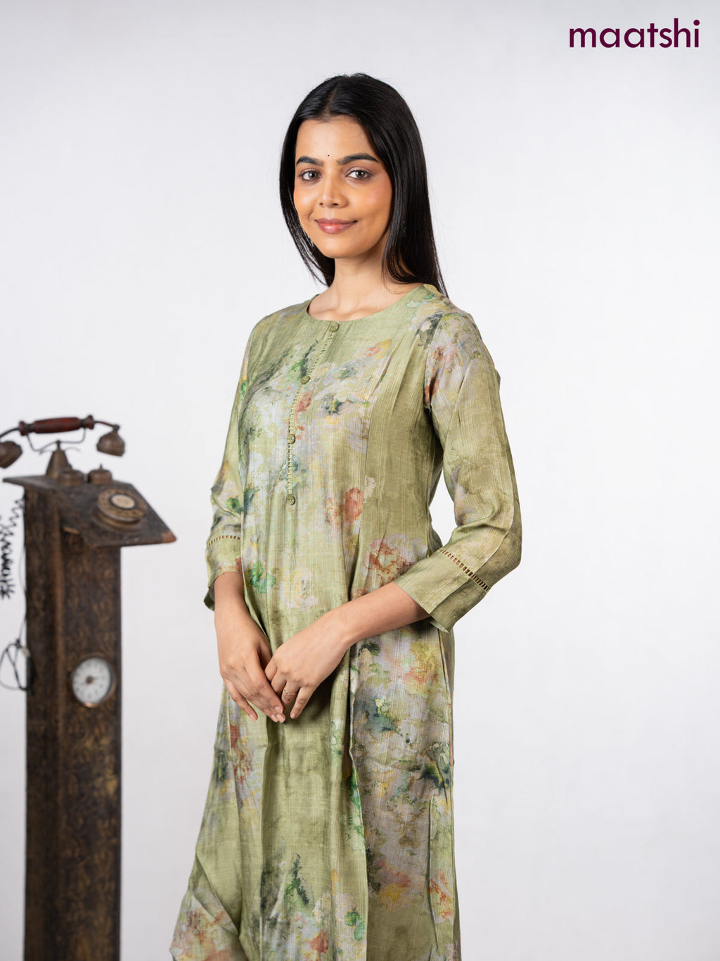 Rayon a-line kurti green with allover prints & simple neck pattern without pant