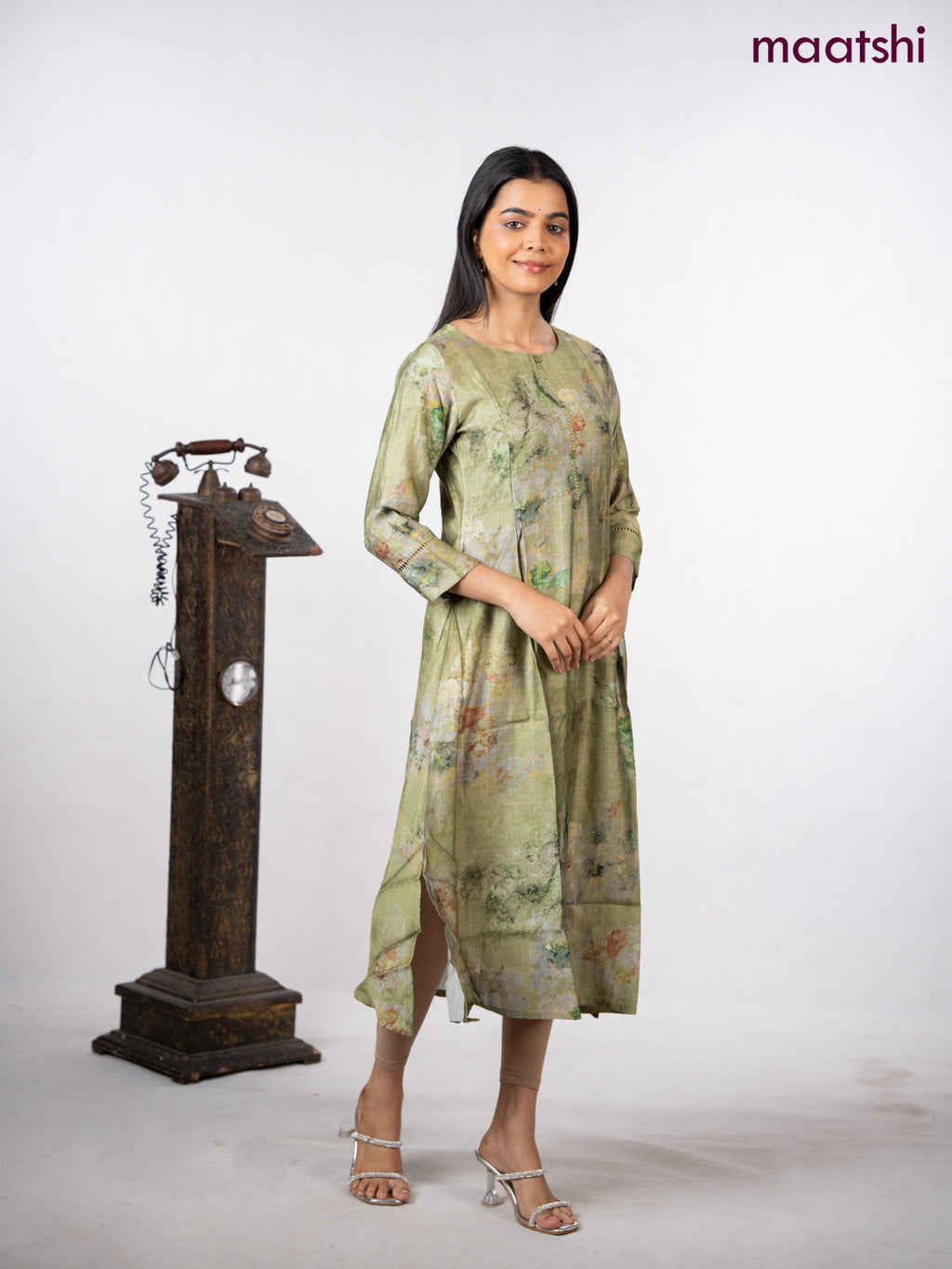 Rayon a-line kurti green with allover prints & simple neck pattern without pant