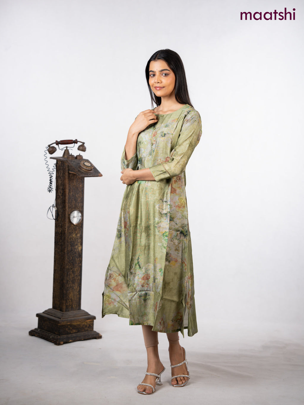 Rayon a-line kurti green with allover prints & simple neck pattern without pant