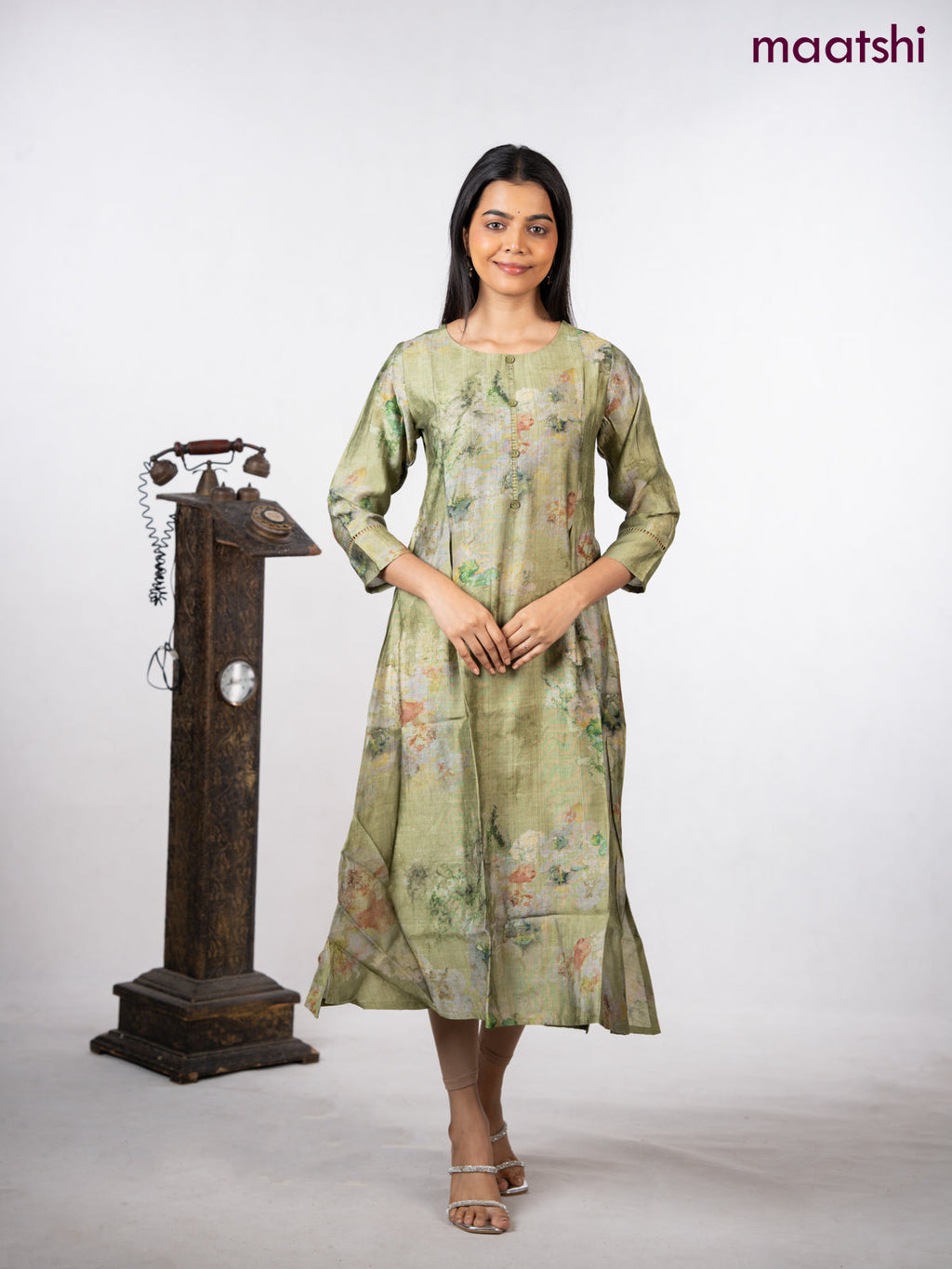 Rayon a-line kurti green with allover prints & simple neck pattern without pant