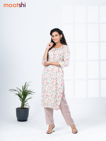 Rayon kurti set off white and multi colour with allover floral prints & simple neck pattern and straight cut pant