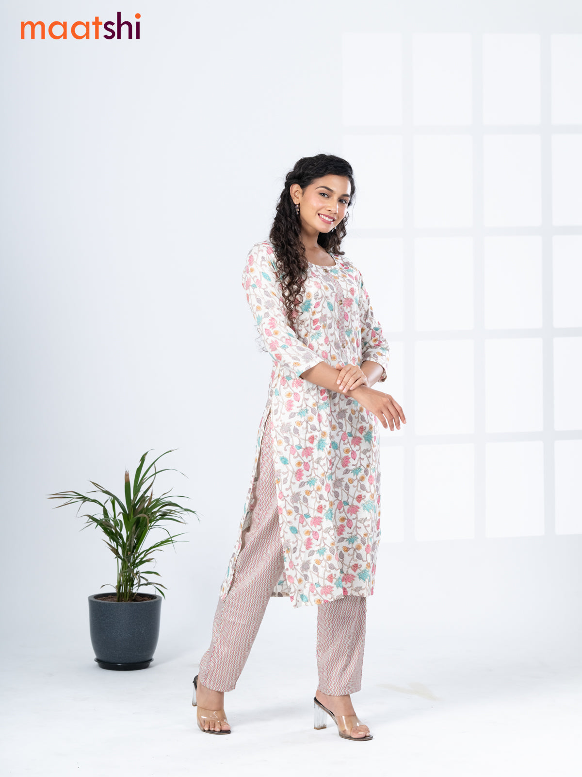 Rayon kurti set off white and multi colour with allover floral prints & simple neck pattern and straight cut pant