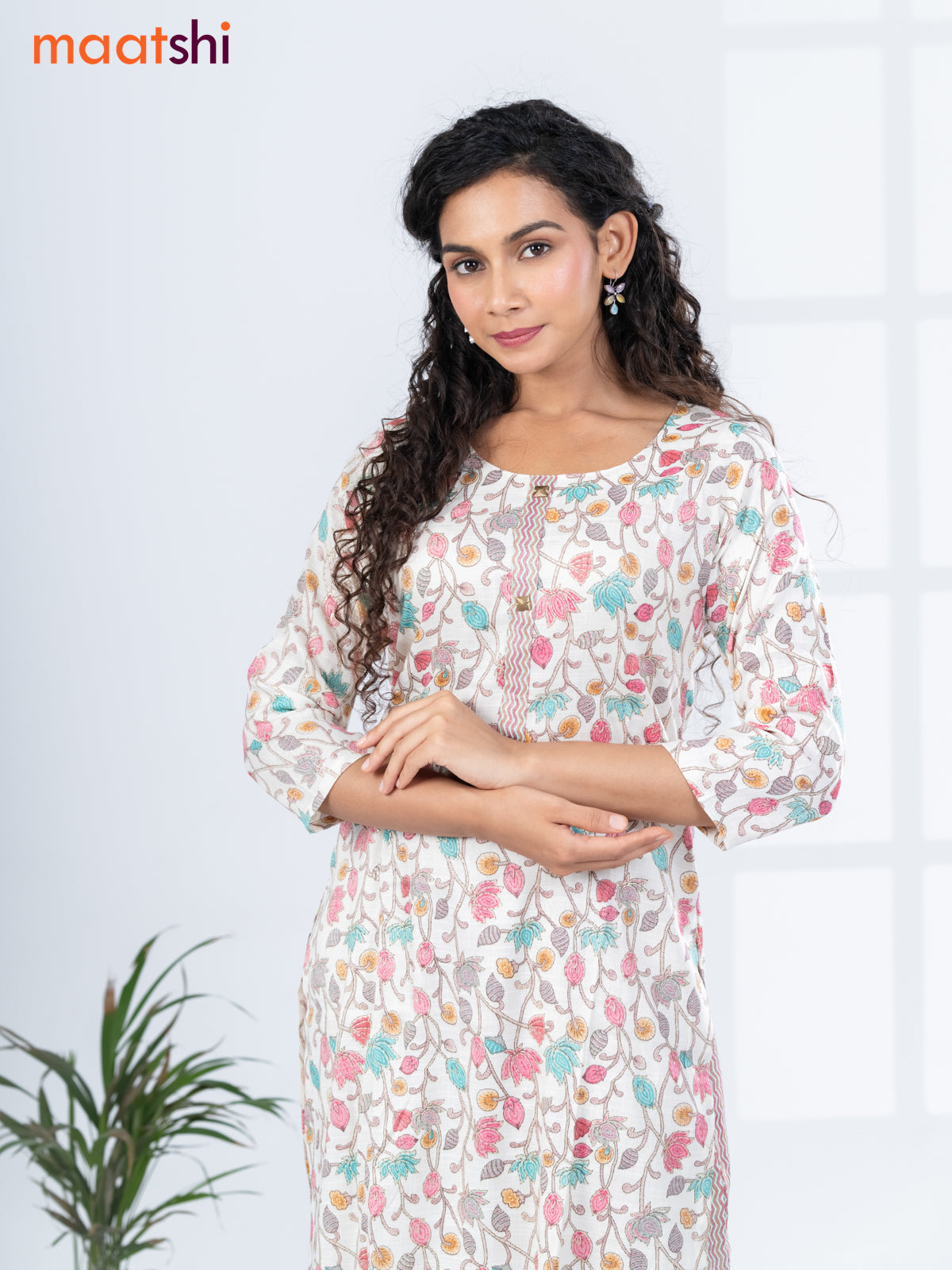 Rayon kurti set off white and multi colour with allover floral prints & simple neck pattern and straight cut pant