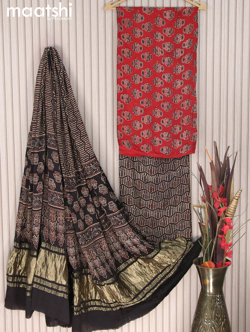 Modal silk dress material maroon and black with allover ajrakh prints and bottom & zari woven printed dupatta