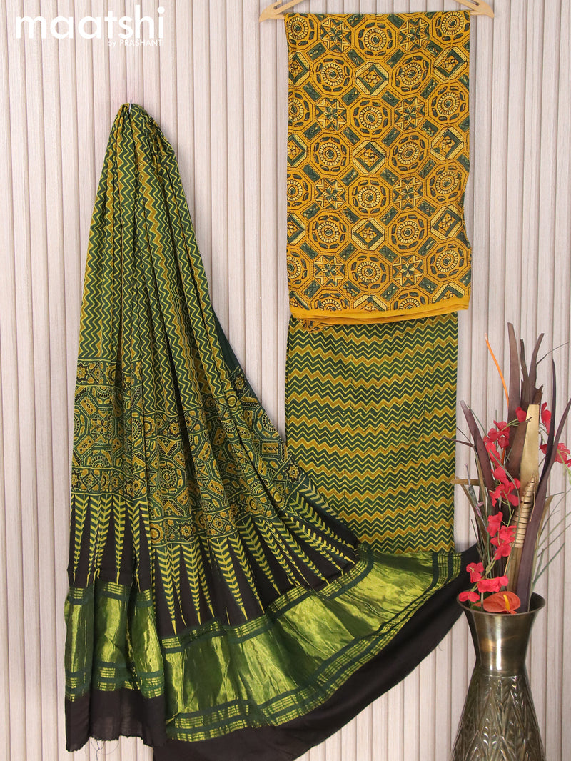 Modal silk dress material yellow and bottle green with allover ajrakh prints and bottom & zari woven printed dupatta