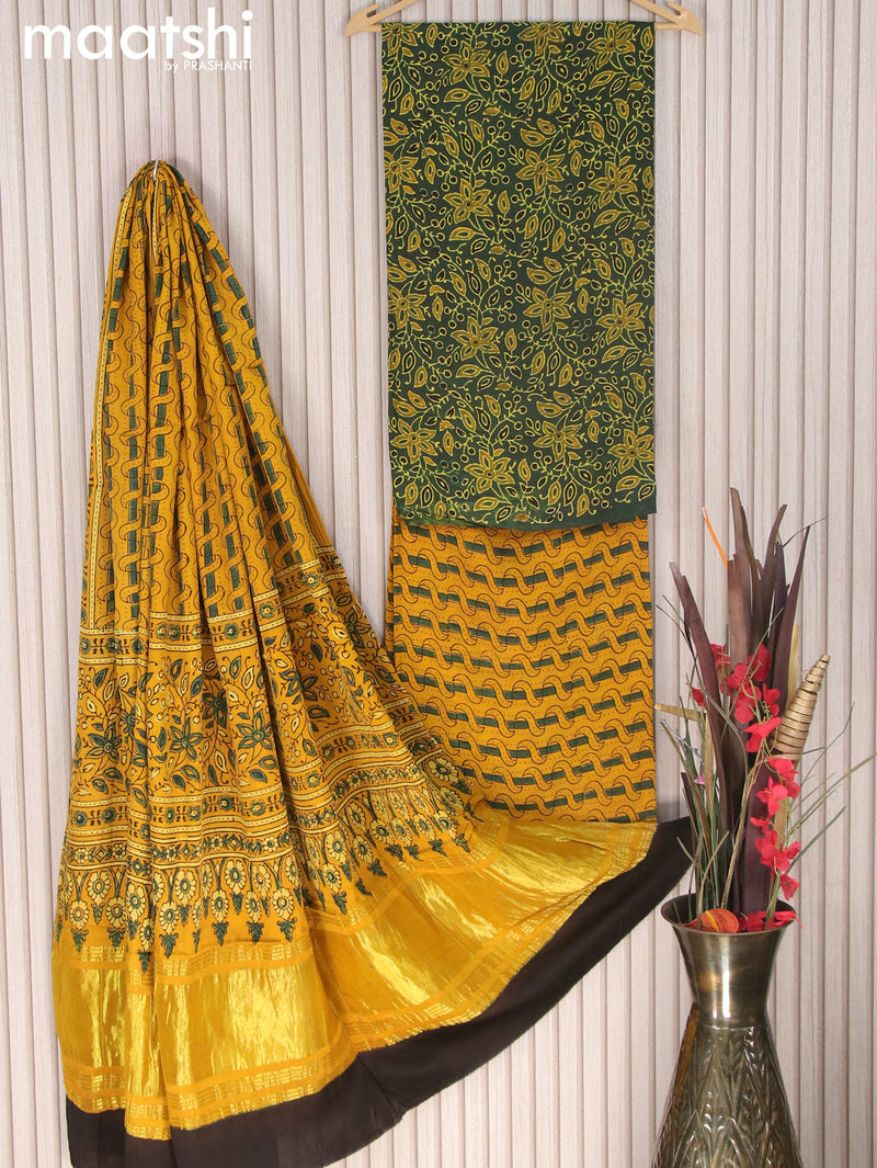 Modal silk dress material green and yellow with allover floral prints and bottom & zari woven printed dupatta