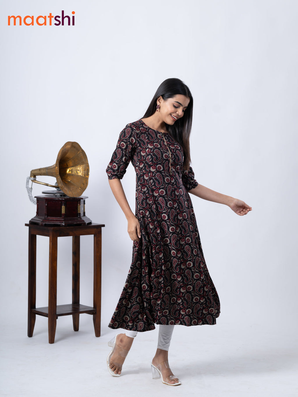 Rayon A -line kurti black with allover prints and without pant