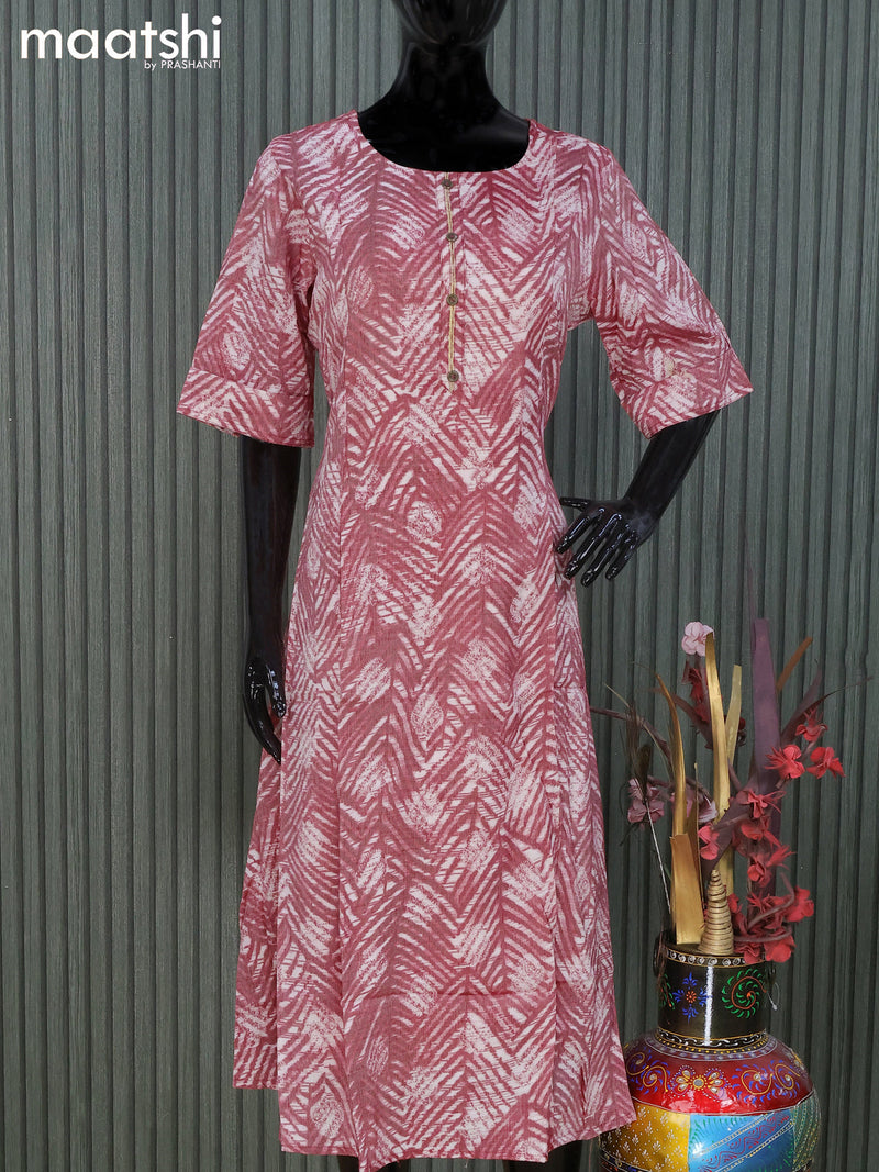 Rayon readymade A -line kurti maroon shade with allover prints and without pant