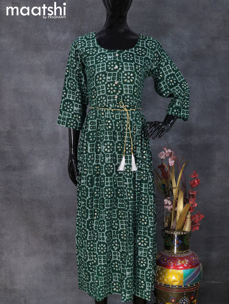 Rayon readymade umbrella kurti dark green with allover batik prints & simple neck pattern and without pant
