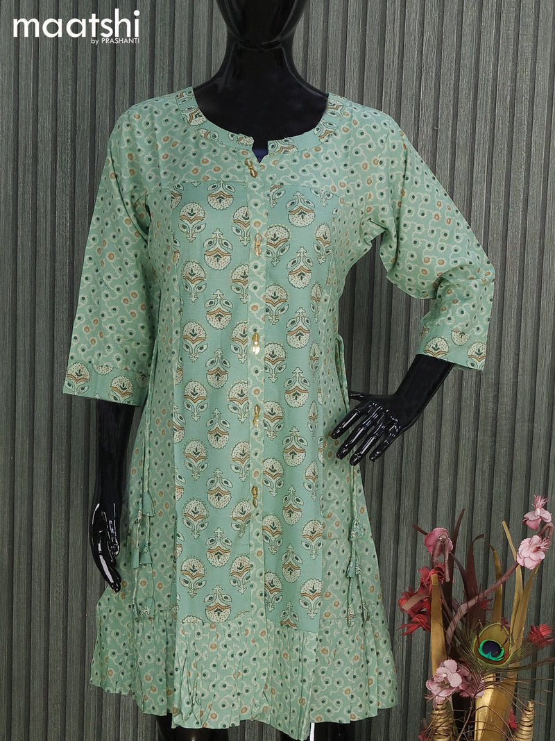 Soft cotton readymade short umbrella kurti pastel green and with allover prints & simple neck pattern and without pant