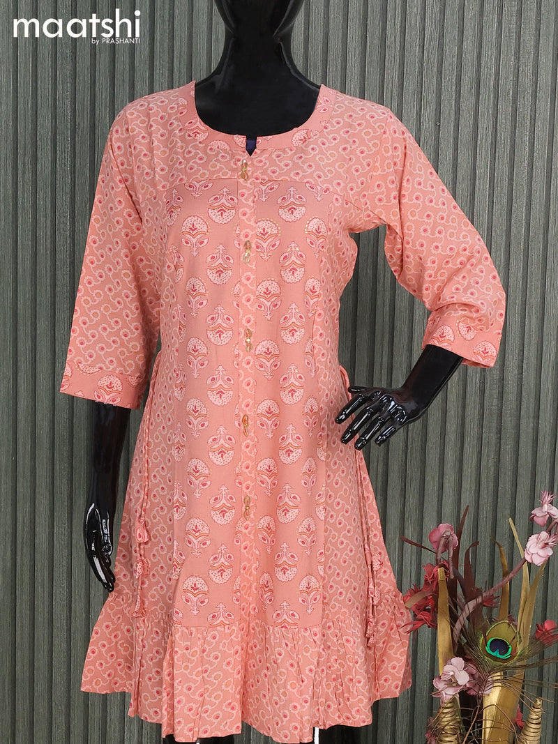 Soft cotton readymade short umbrella kurti pastel peach and with allover prints & simple neck pattern and without pant