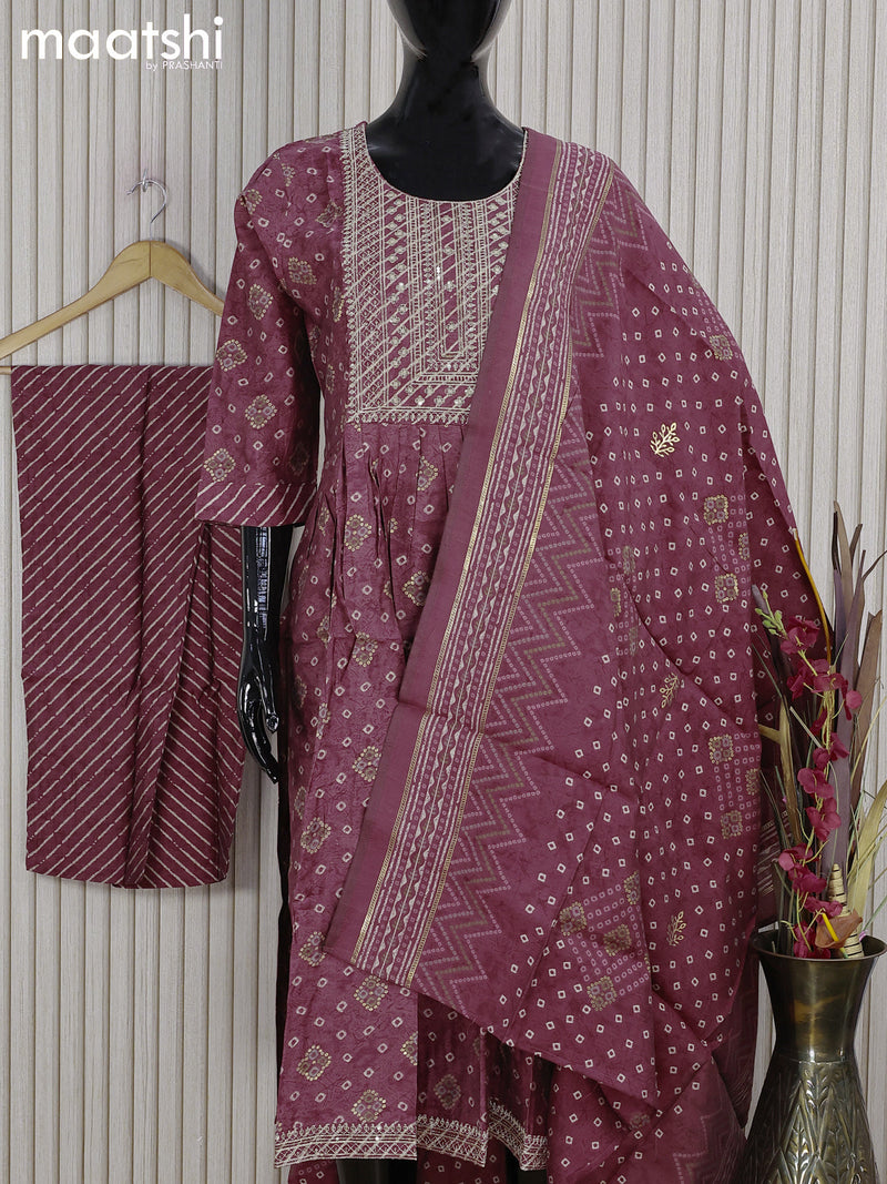 Muslin readymade naira cut salwar suits pastel maroon shade and with allover butta prints & sequin work neck pattern and straight cut pant & printed dupatta