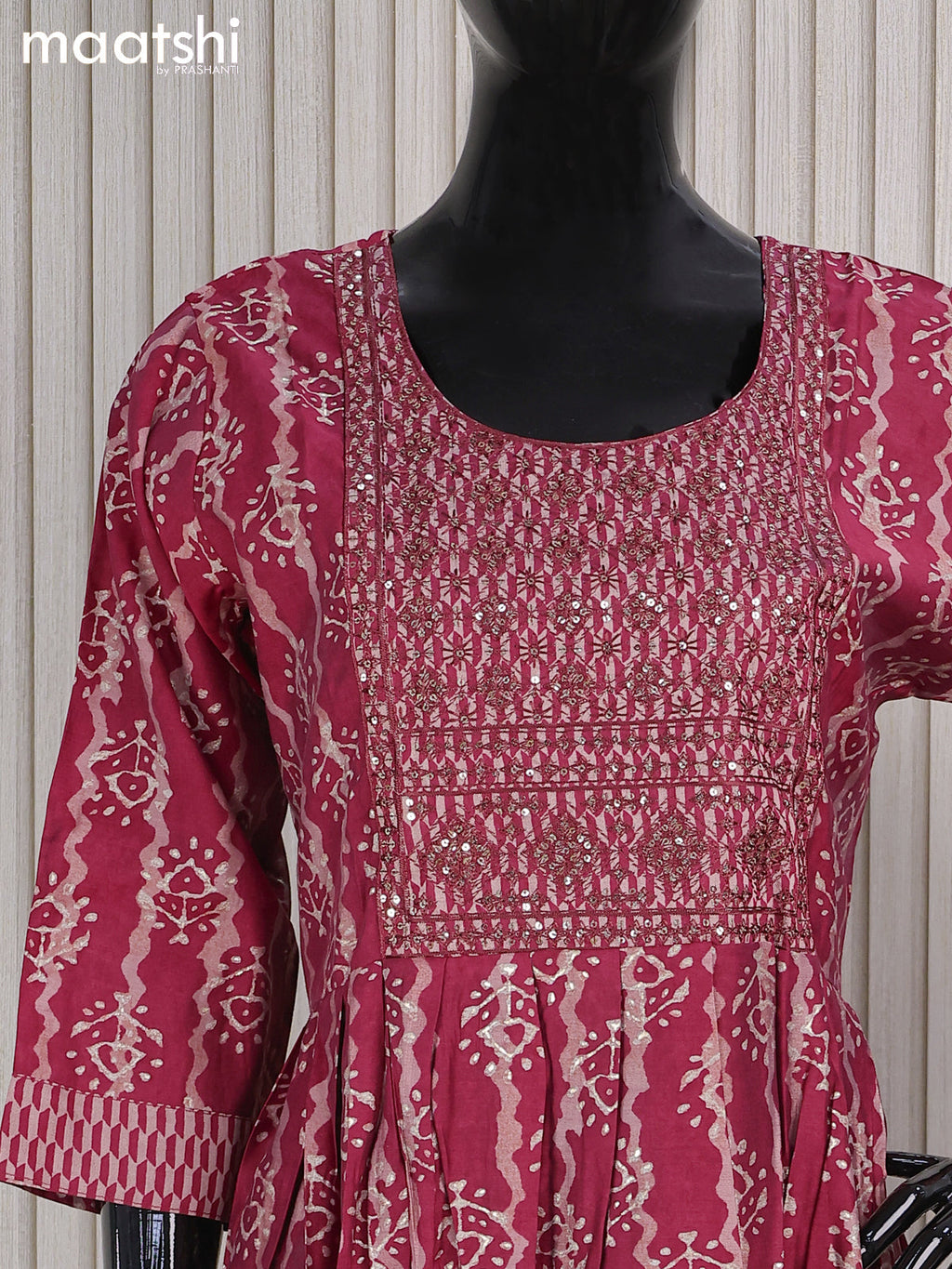 Muslin readymade naira cut salwar suits maroon shade and with allover prints & sequin work neck pattern and straight cut pant & printed dupatta