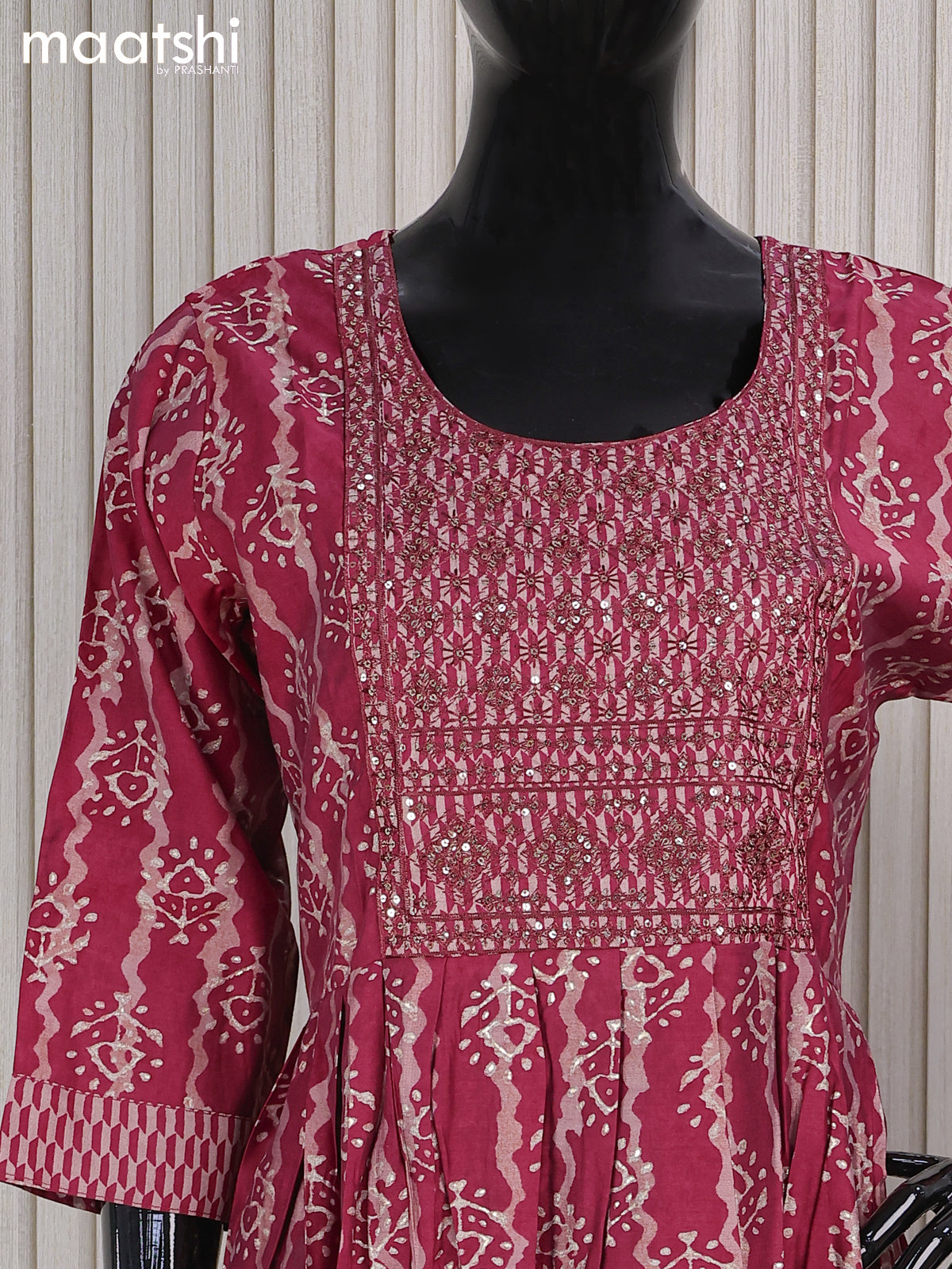 Muslin readymade naira cut salwar suits maroon shade and with allover prints & sequin work neck pattern and straight cut pant & printed dupatta