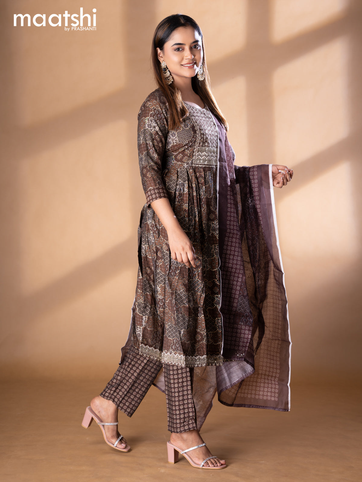 Modal readymade naira cut salwar suits brown with allover prints & sequin work neck pattern and straight cut pant & printed dupatta