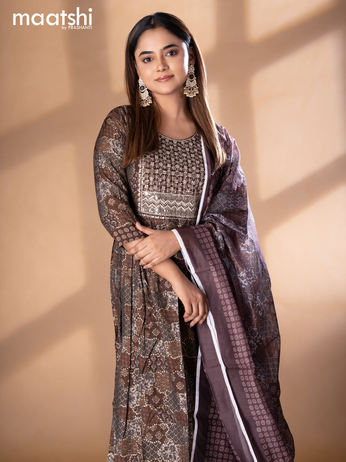 Modal readymade naira cut salwar suits brown with allover prints & sequin work neck pattern and straight cut pant & printed dupatta